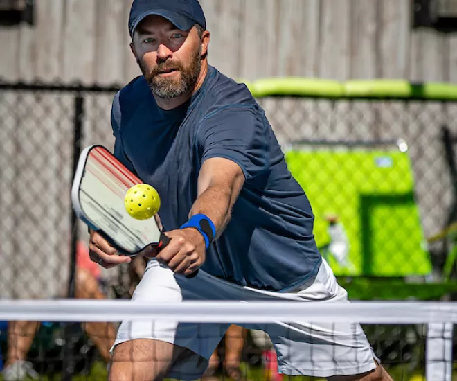 Man playing pickleball
