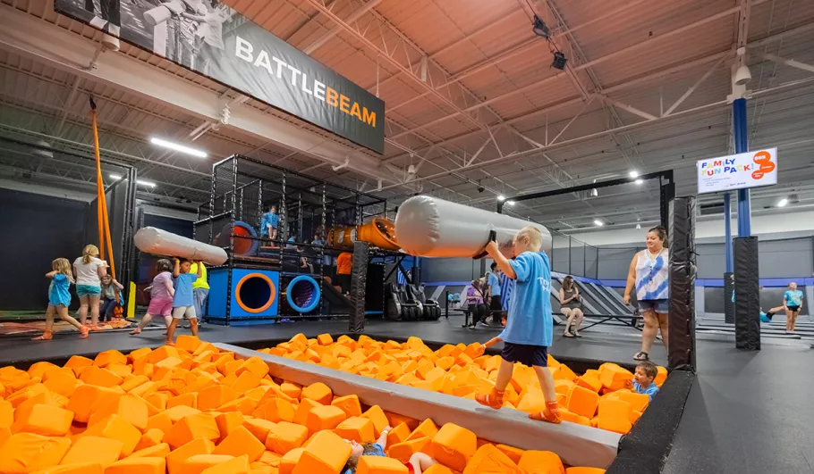 Sky Zone Trampoline Park kids on battle beam