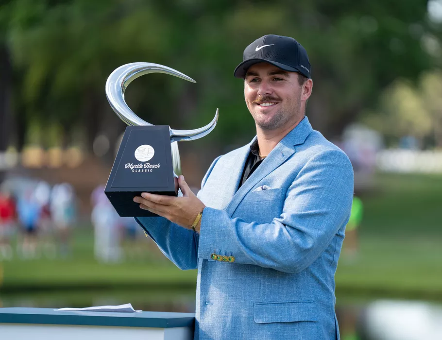 Chris Gotterup, 2024 Myrtle Beach Classic tournament champion holding trophy